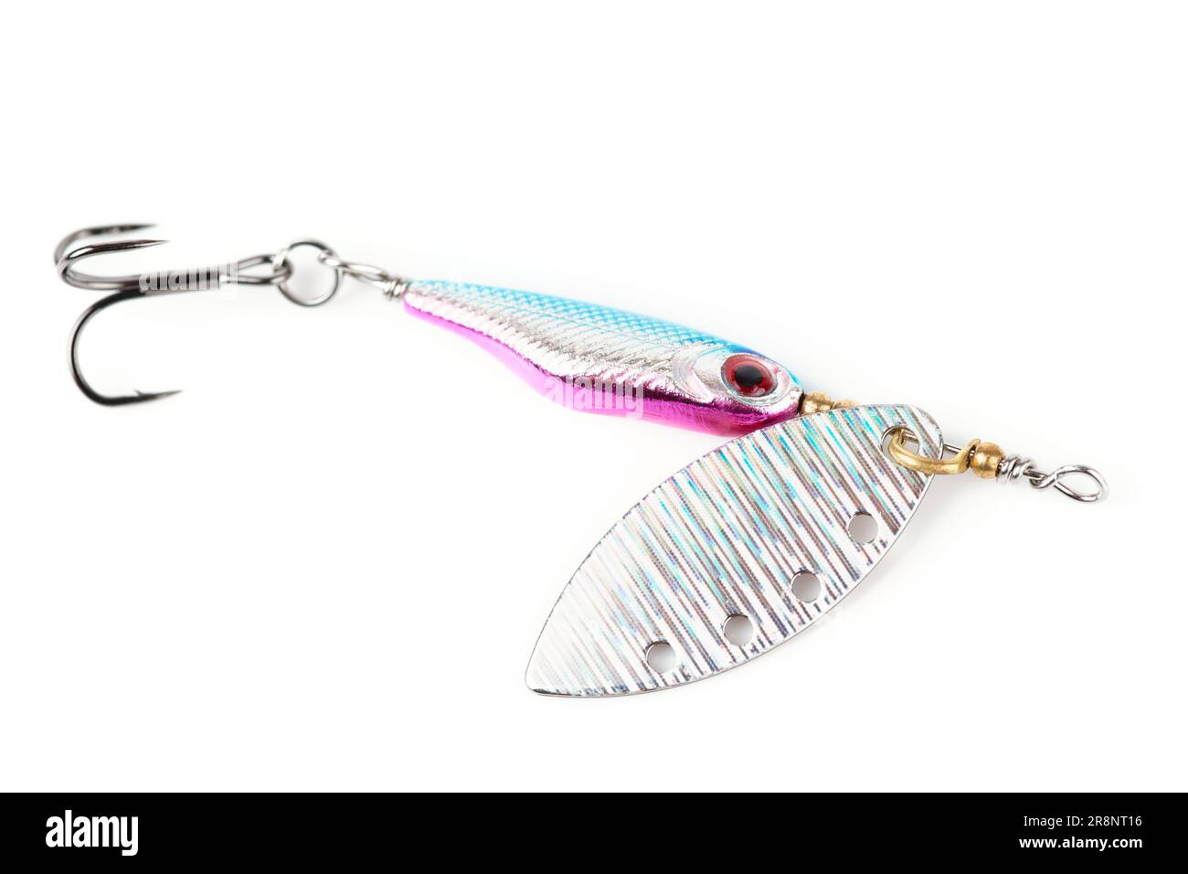 Spinner, attira per la pesca dei predatori, sparato su una superficie bianca Foto Stock
