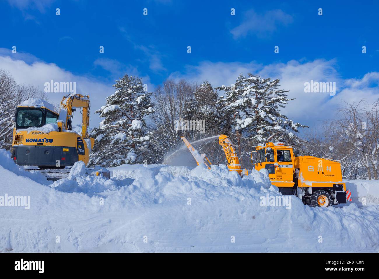 Scenario di rimozione della neve Foto Stock