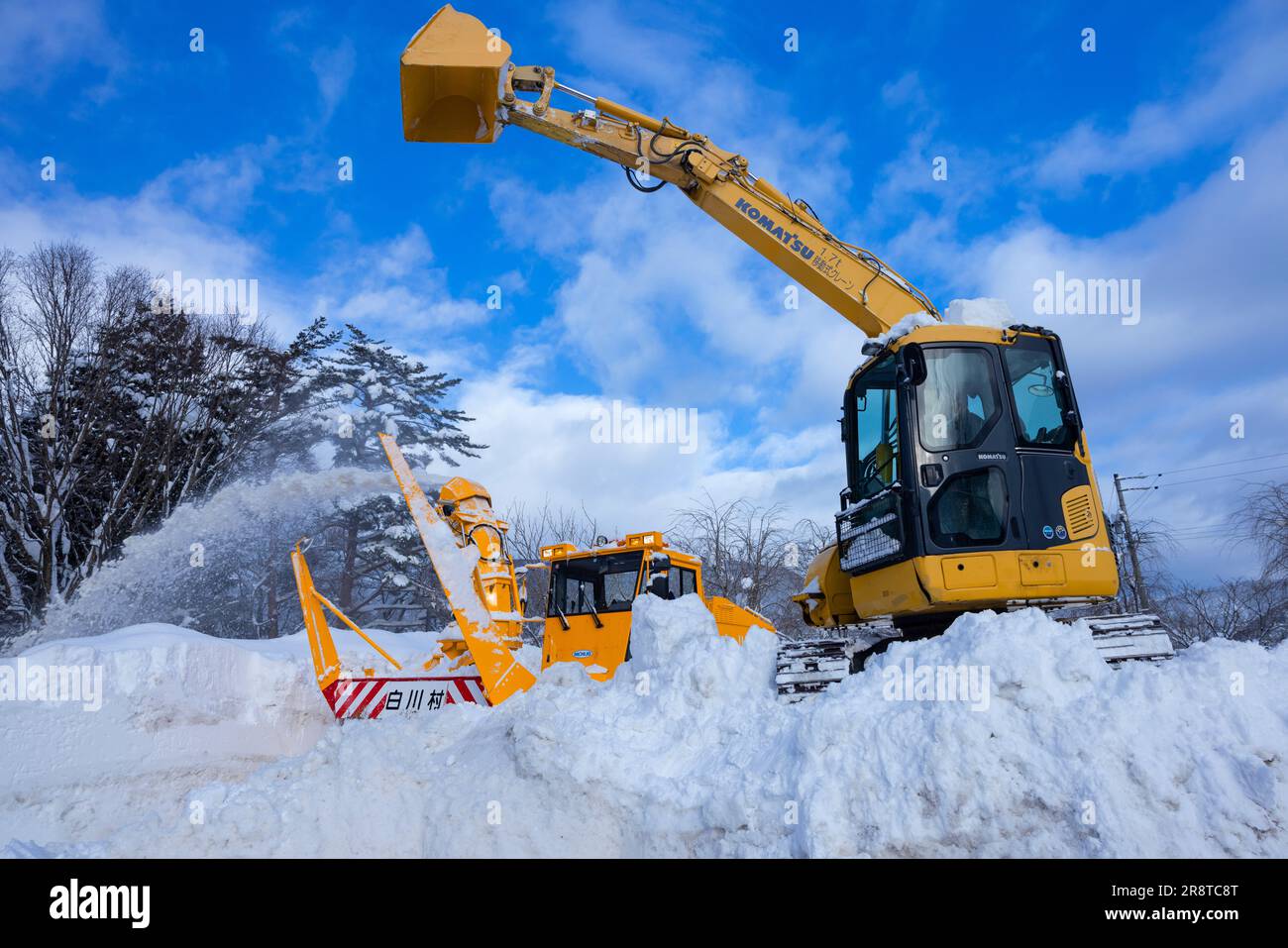 Scenario di rimozione della neve Foto Stock