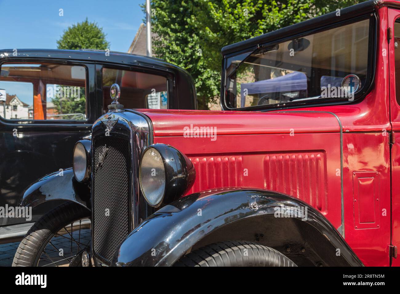 Una Austin Seven rossa ad una mostra d'auto d'epoca. Foto Stock