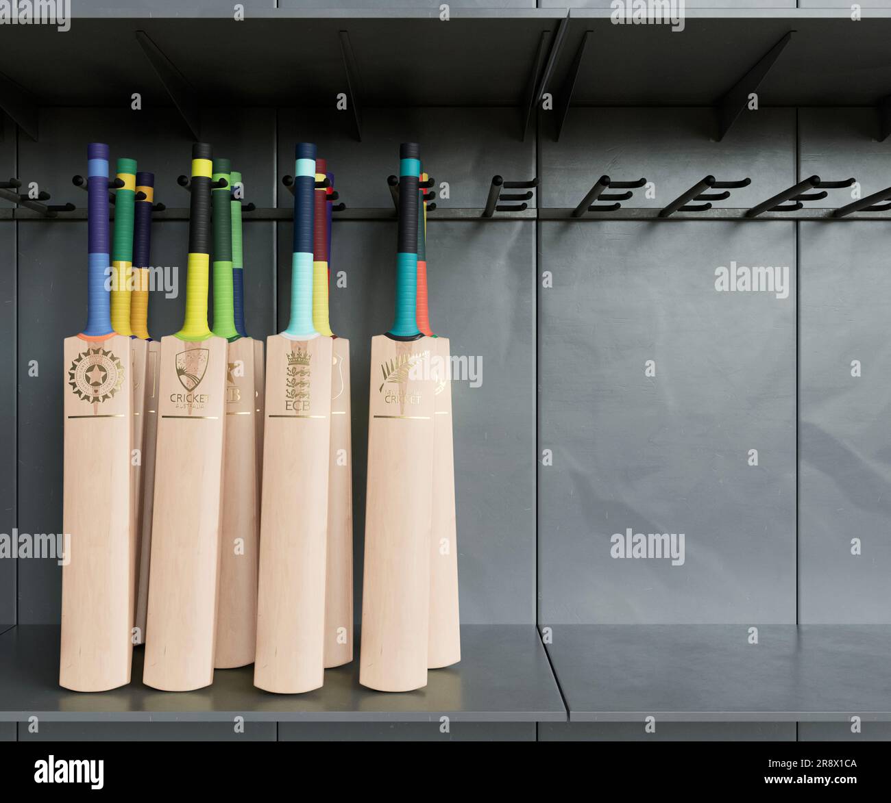 Una collezione di mazze da cricket impresse con loghi dorati dei paesi affiliati all'ICC, disposti su un espositore dello scaffale - 2 aprile 2023 Foto Stock