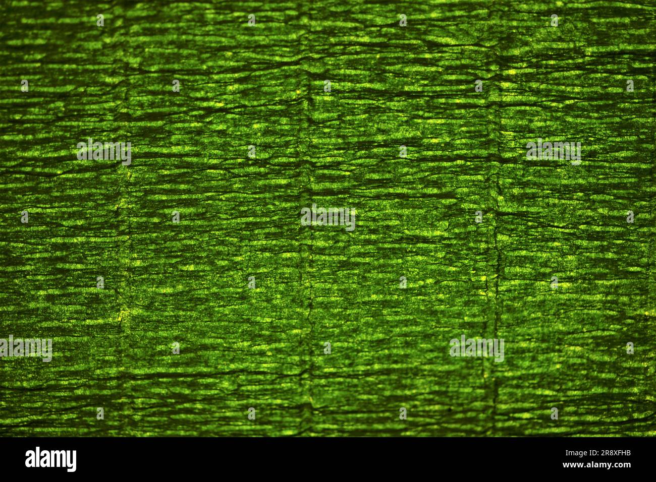 Sfondo verde intenso con onde scure. Foto Stock