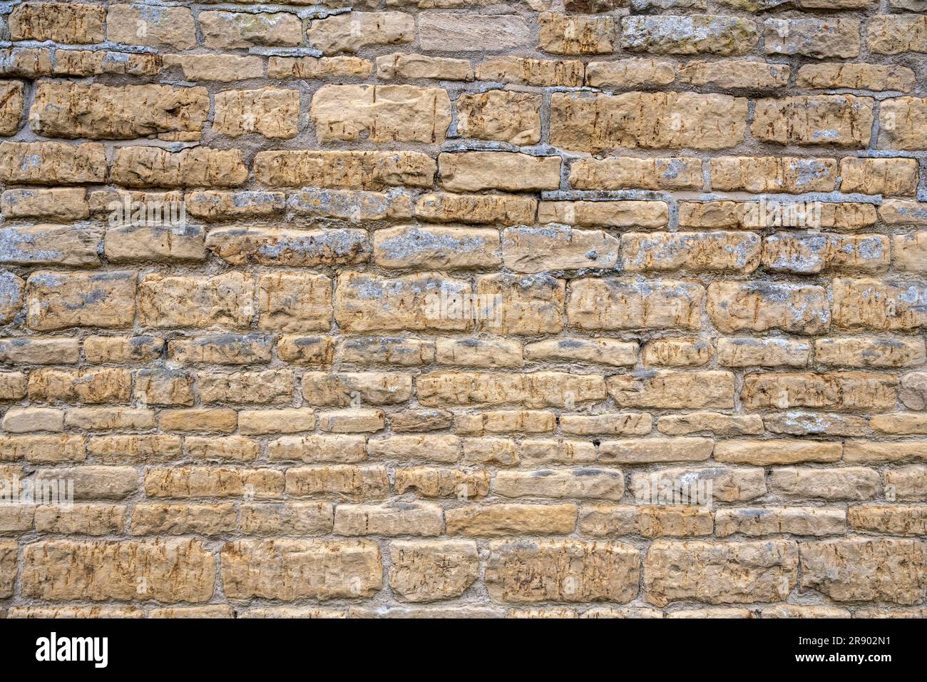 Blocchi in muratura calcarea gialla in pietra di Cotswold, Format Filling, Cotswolds, Gloucestershire, Inghilterra, Regno Unito Foto Stock