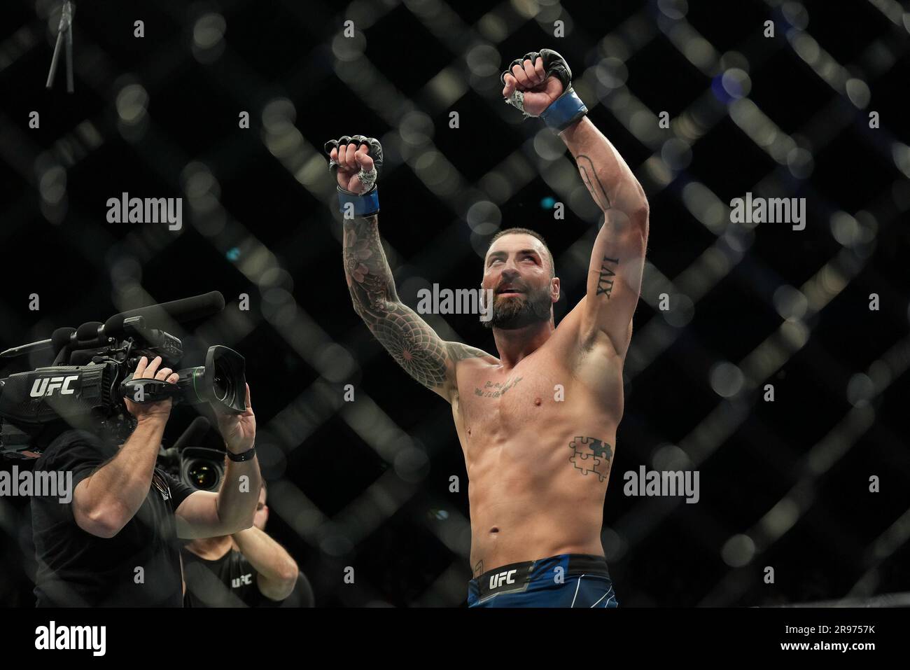 Paul Craig di Scozia celebra la sua vittoria durante la UFC London Fight Night all'O2 di Londra, in Inghilterra, il 19 marzo 2022. Foto di Andy Rowland. Foto Stock