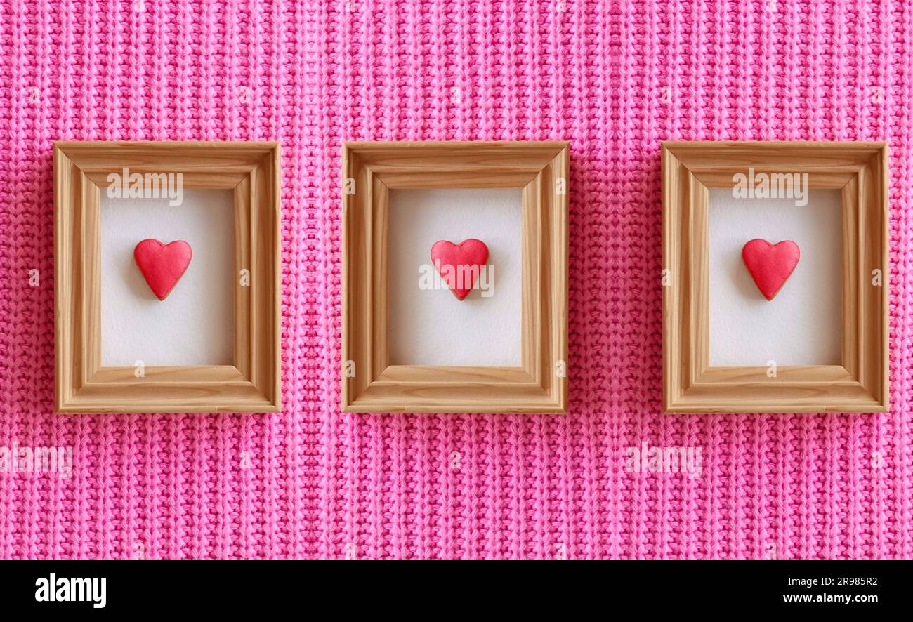 Tre cuori nel quadro Foto Stock