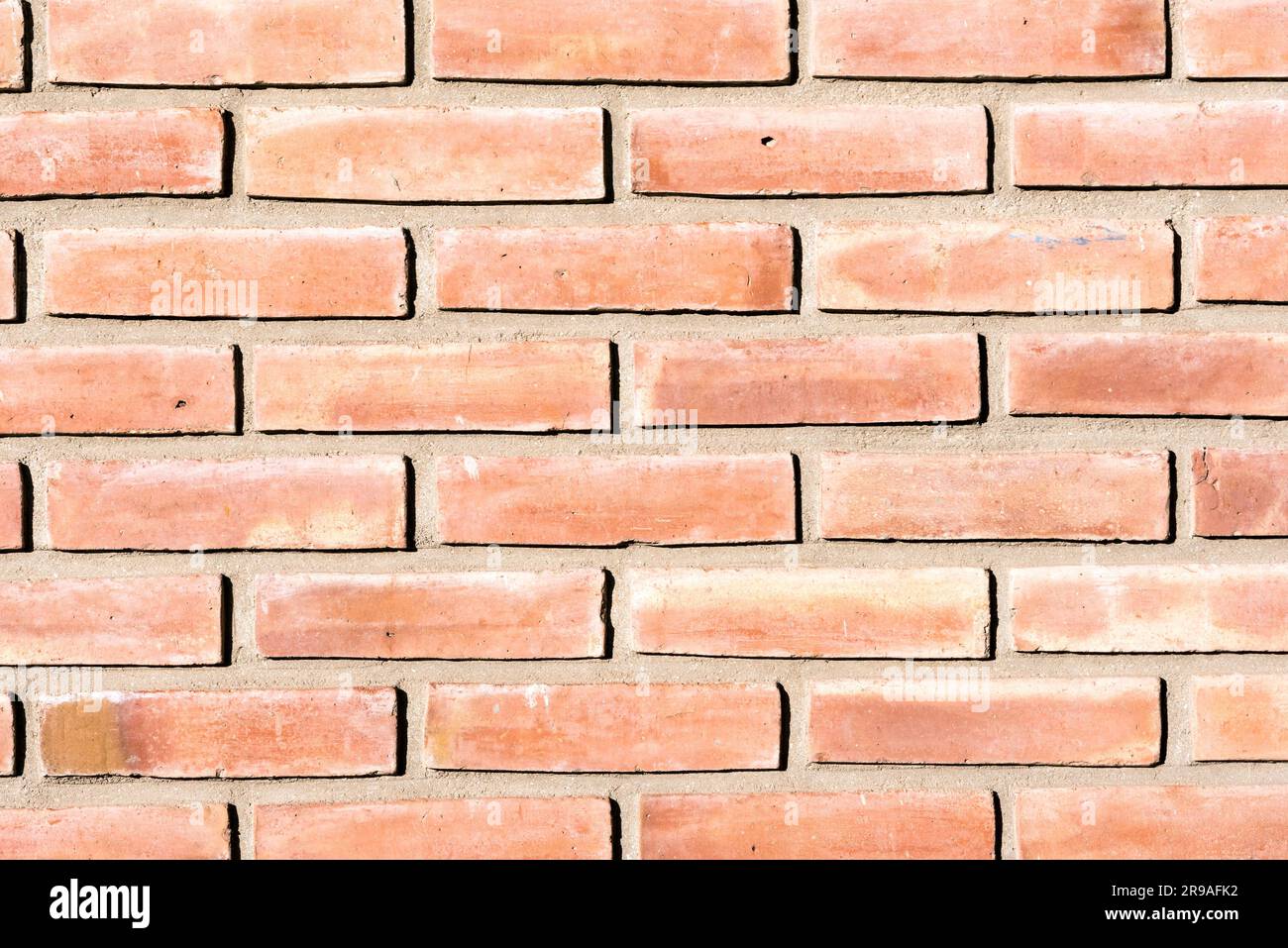 Sfondo da un vecchio muro di mattoni rossi Foto Stock