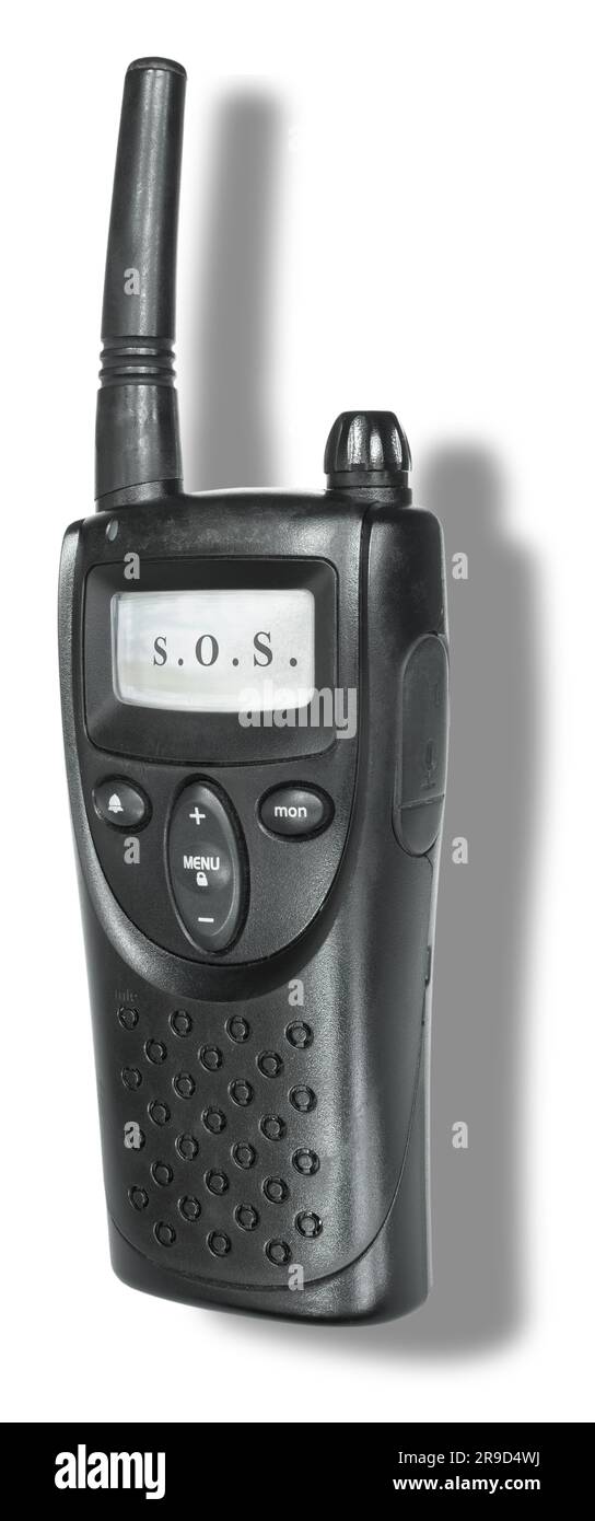 SOS in arrivo sul display di un walkie talkie con l'ombra dietro Foto Stock