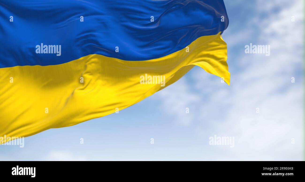 Bandiera nazionale dell'Ucraina che sventola nel vento in una giornata limpida. Due bande orizzontali uguali di blu e giallo. Democrazia e politica. spia 3d Foto Stock