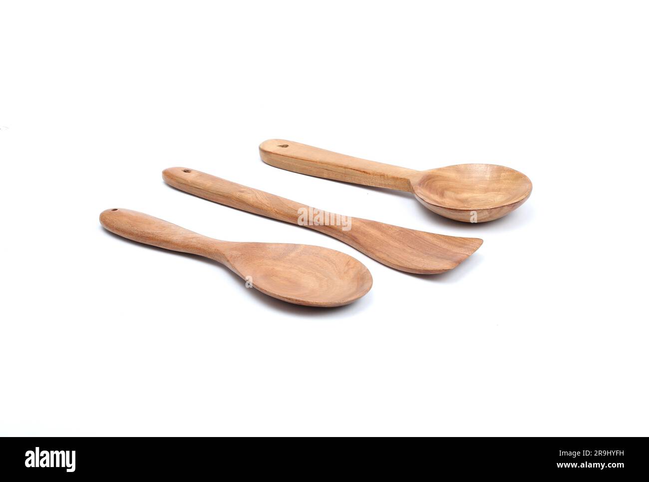 Cucchiai in legno per cucinare, utensili da cucina in legno isolati su sfondo bianco Foto Stock