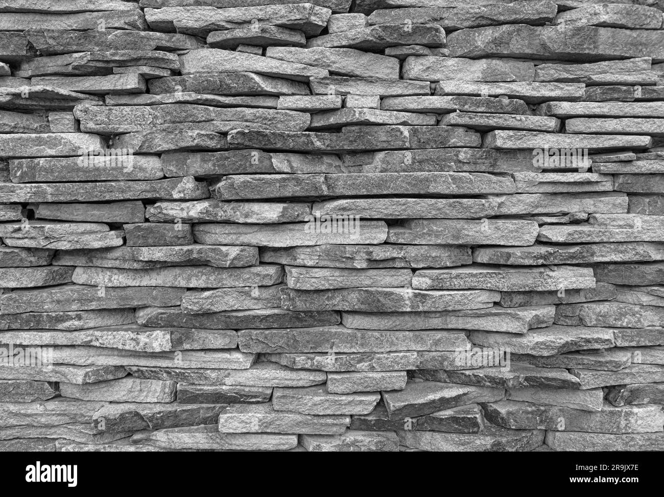 Sullo sfondo di un muro di pietra foto di texture. Foto Stock