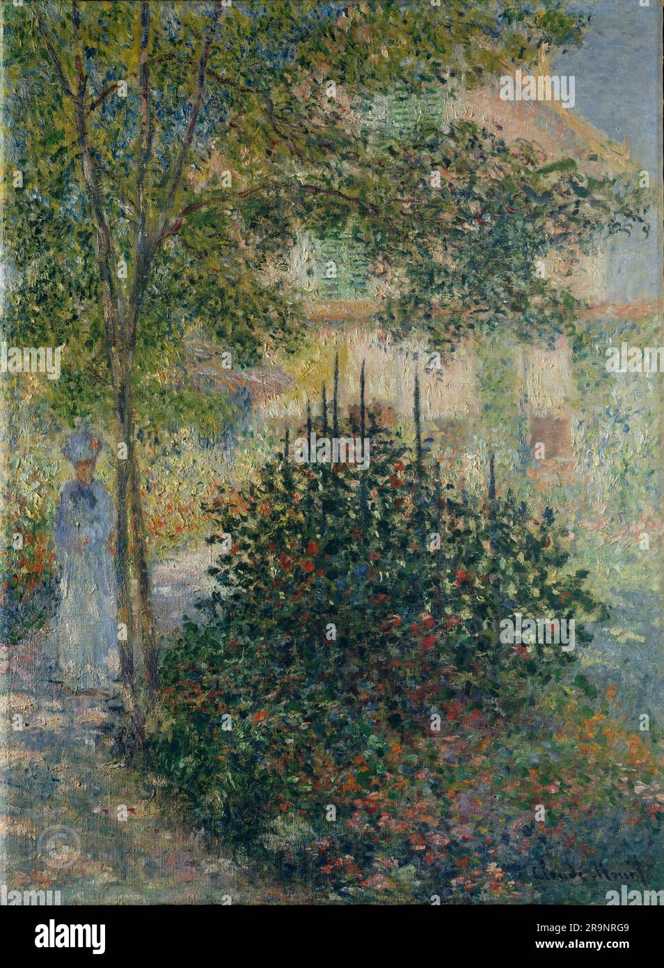 Claude Monet - Camille Monet (1847–1879) nel giardino di Argenteuil Foto Stock