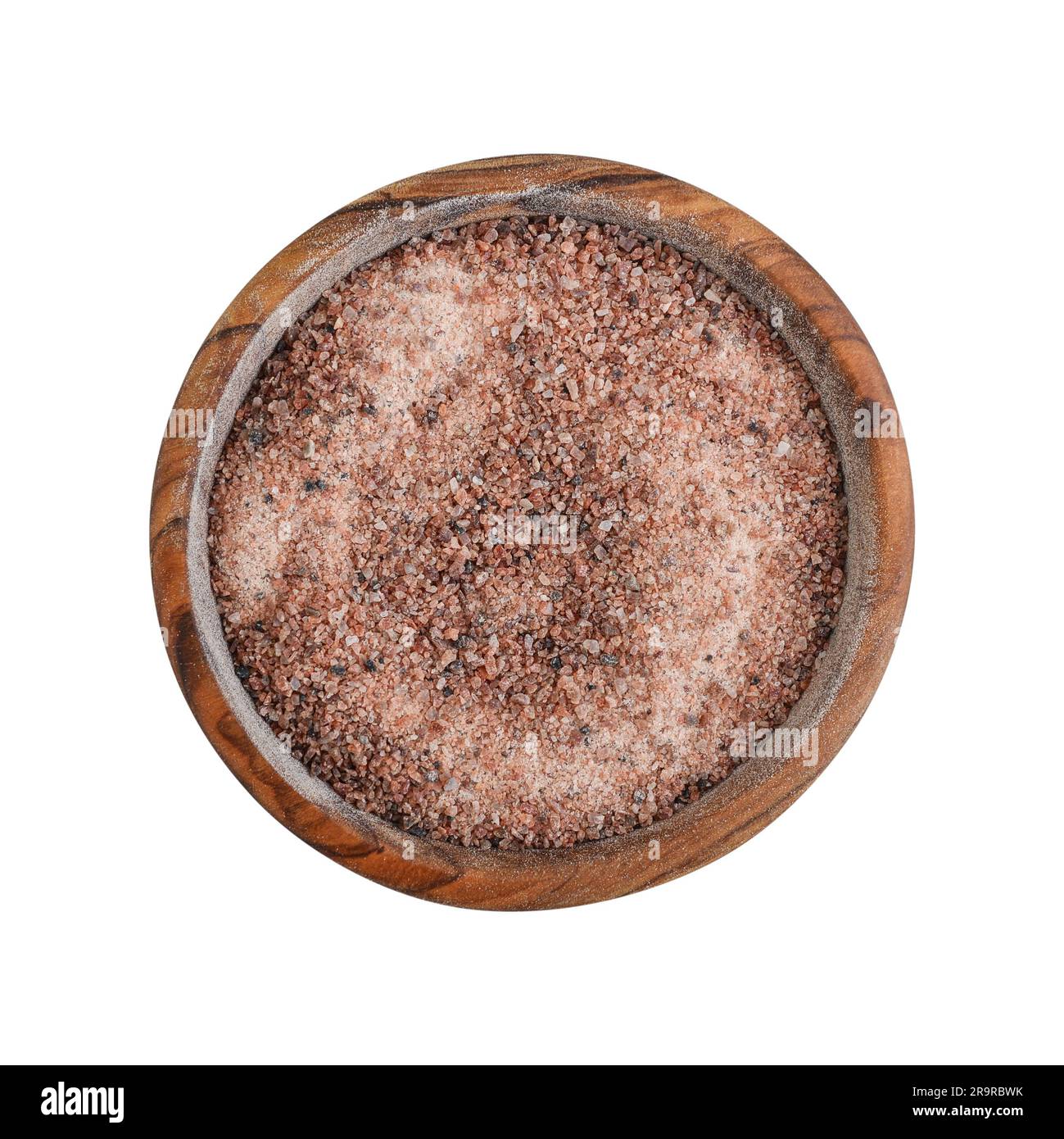 Sale nero Hymalaiano in una ciotola di legno isolata su fondo bianco. Vista dall'alto Foto Stock