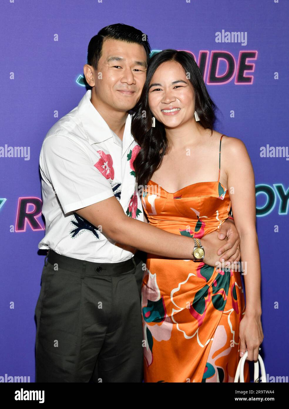 Ronny Chieng, left, and wife Hannah Pham attend the special screening of "Joy Ride" at Metrograph on Wednesday, June 28, 2023, in New York. (Photo by Evan Agostini/Invision/AP) Foto Stock