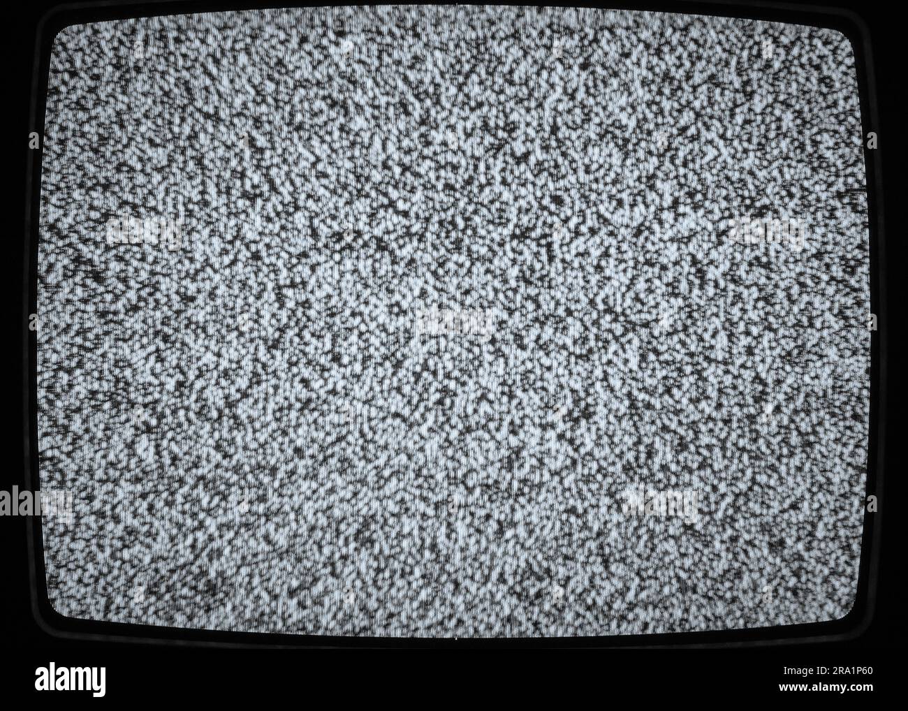 Primo piano dello schermo della televisione analogica senza segnale. Foto Stock