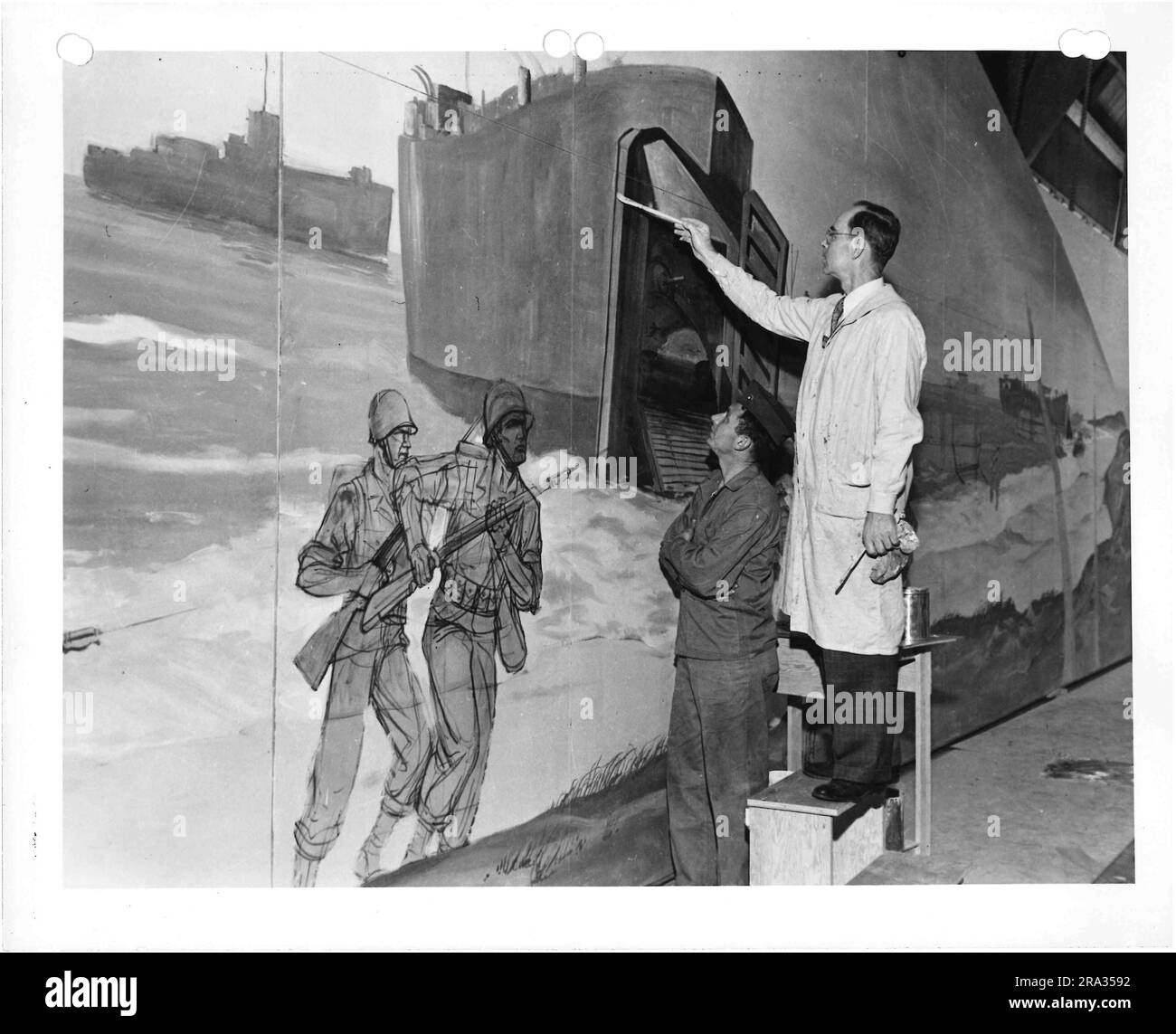 Fotografia di due uomini, un murale. Foto Stock