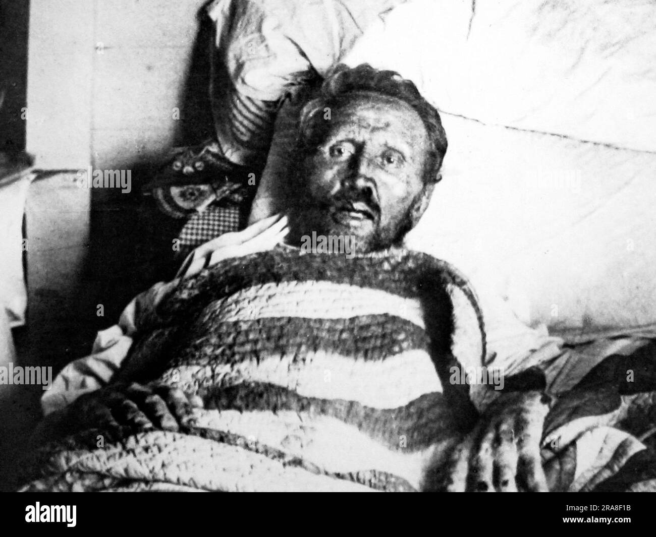 Padre Damien nel suo letto di morte nel 1889 Foto Stock