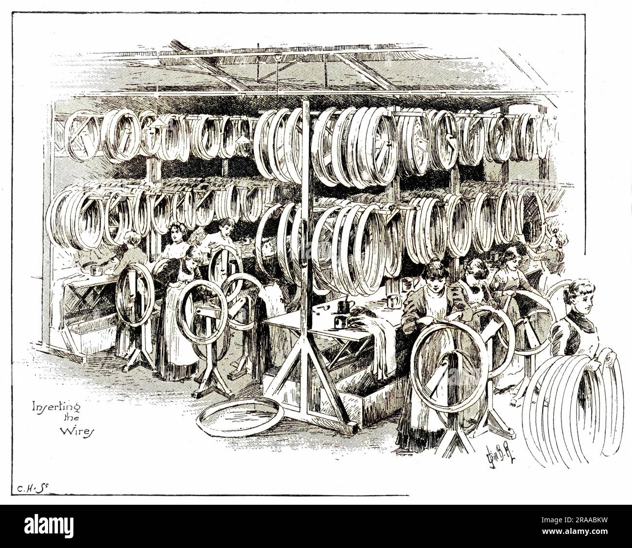 Fabbricazione di accessori per il ciclismo: Donne che inseriscono i fili negli pneumatici Dunlop. Data: 1896 Foto Stock