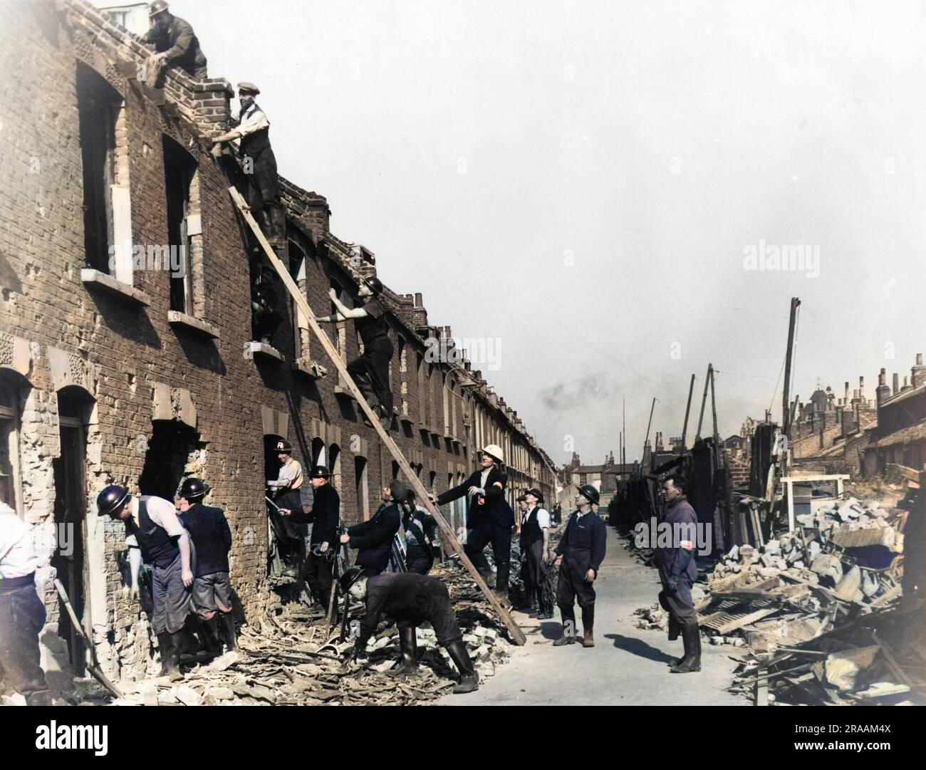 Danni da bombe a Sidney Street, East London, WW2. Entrambi i lati dell'intera strada sono stati distrutti da due bombe. Data: 1940 Foto Stock