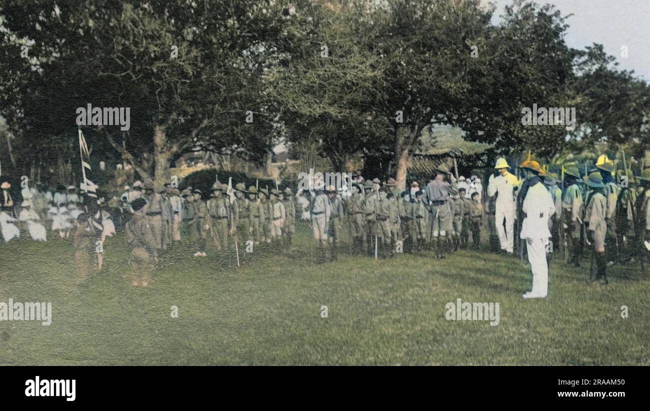 Cuccioli e scout delle Bahamas in parata. Foto Stock
