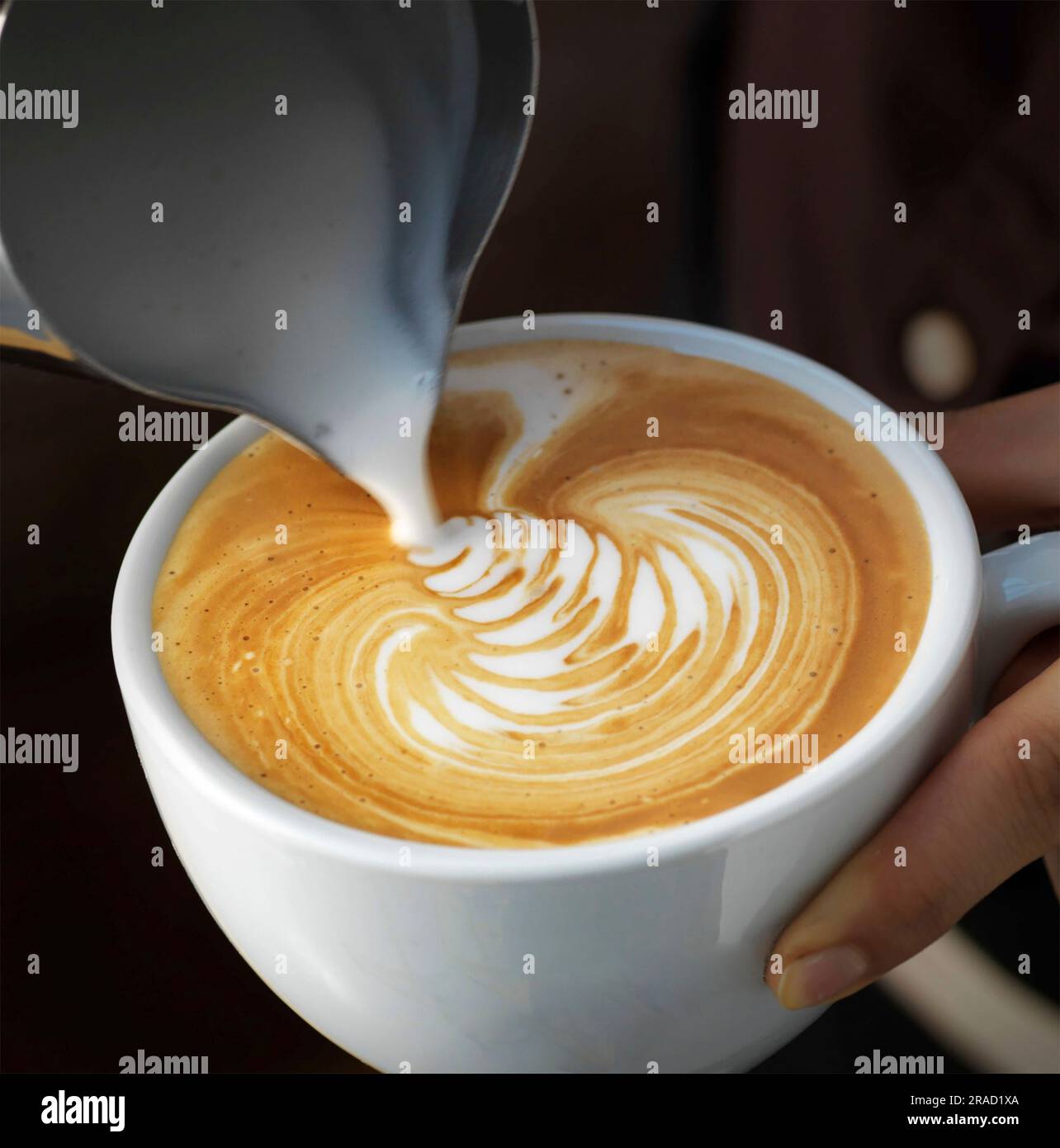 Cappuccino con latte art Foto Stock