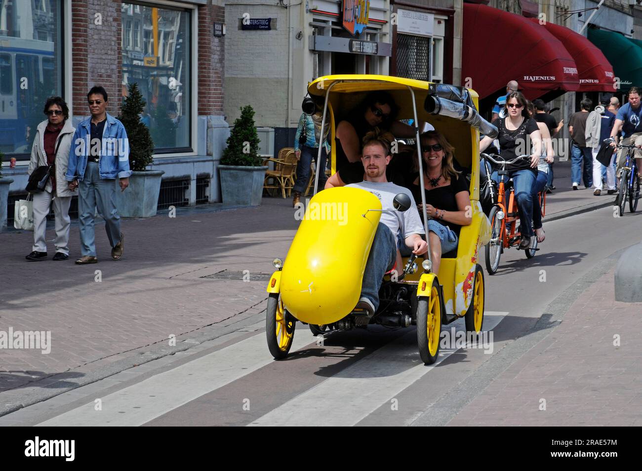 Taxi in bicicletta, città vecchia di Amsterdam, Paesi Bassi Foto Stock