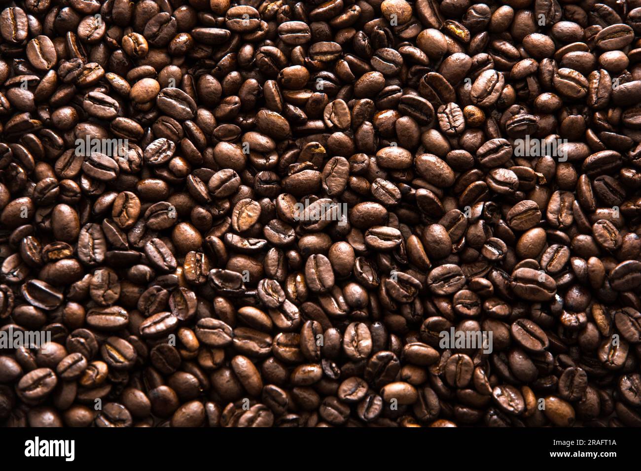 primo piano della consistenza dei semi di caffè marrone Foto Stock