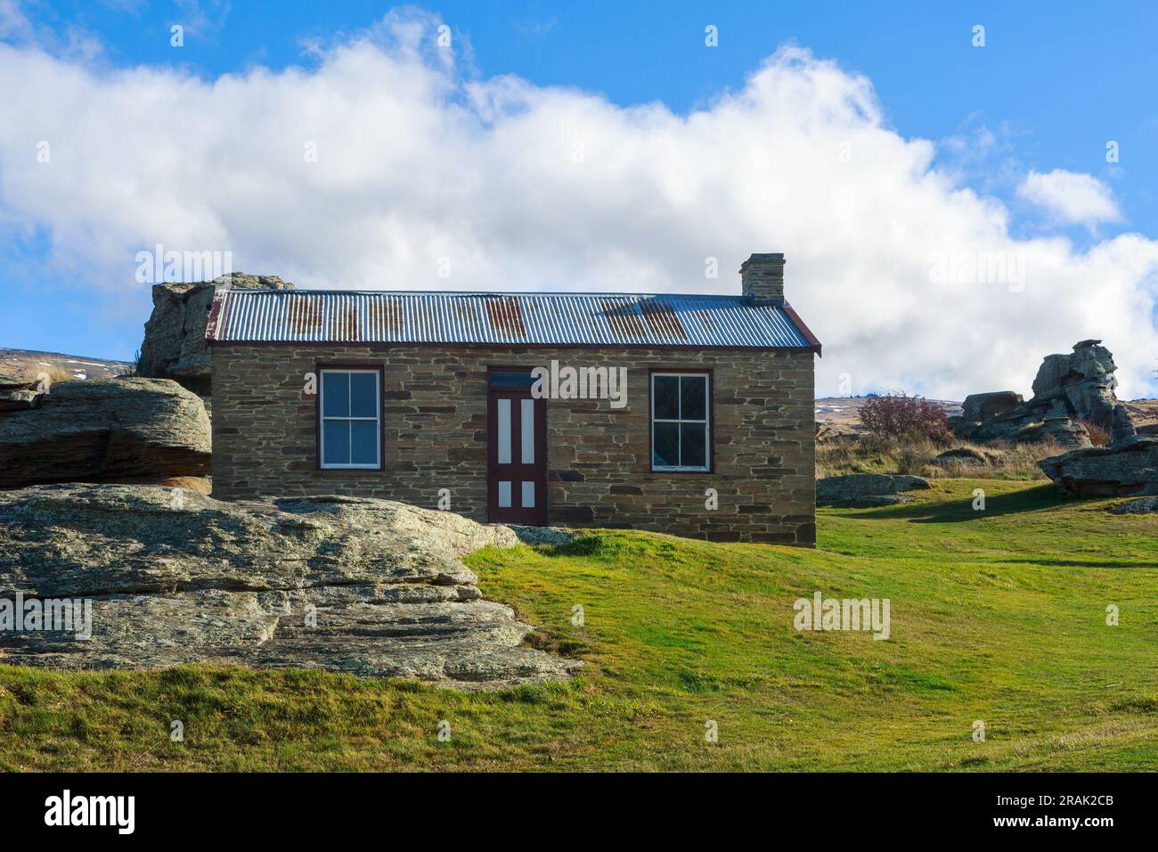 Mitchell's Cottage, una casa di minatori d'oro degli anni '1880 nella regione centrale di Otago, nell'Isola del Sud della nuova Zelanda Foto Stock