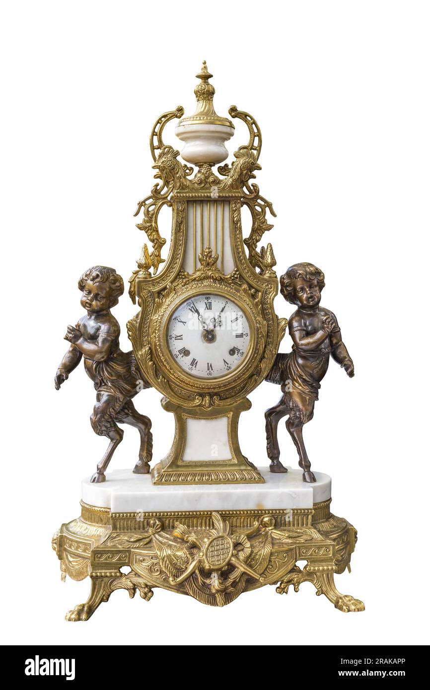 Vecchio orologio da tavolo con ricche decorazioni Foto Stock