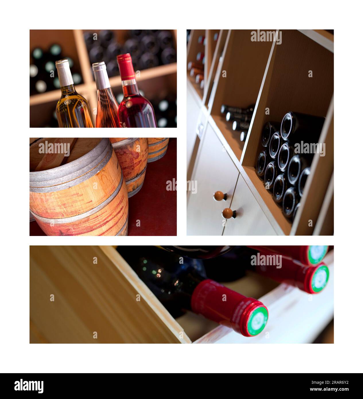 Bottiglie e botti di vino in una cantina Foto Stock