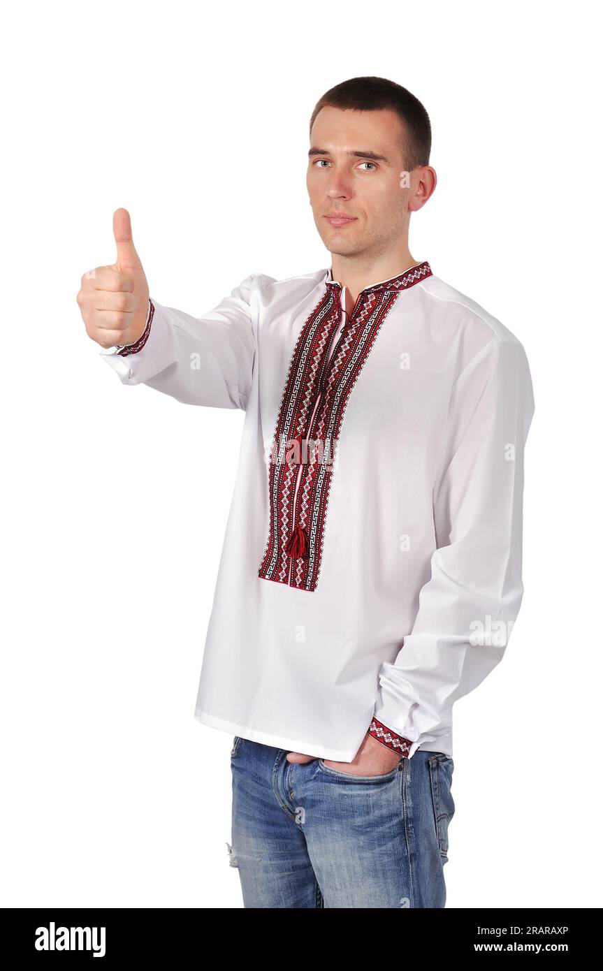 Guy in ucraino camicia ricamata con il pollice in alto Foto Stock