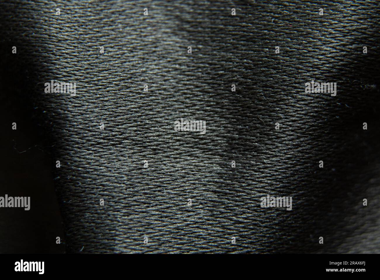 tessuto grigio scuro, foto macro come sfondo in primo piano Foto Stock