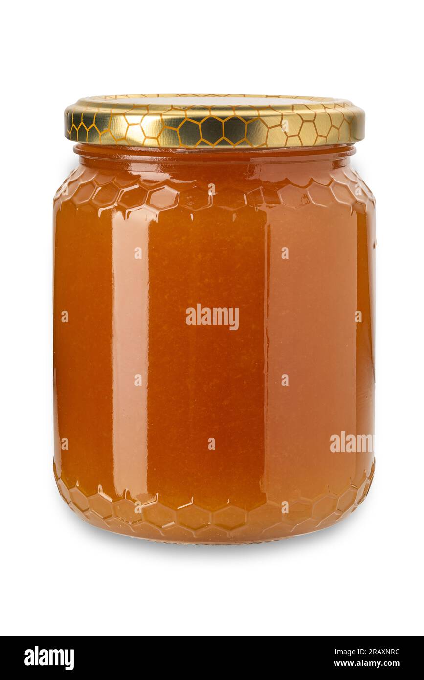 Miele cremoso di castagne in vaso di vetro, miele cristallizzato che ne indica l'autenticità. Isolato su bianco con percorso di ritaglio incluso Foto Stock