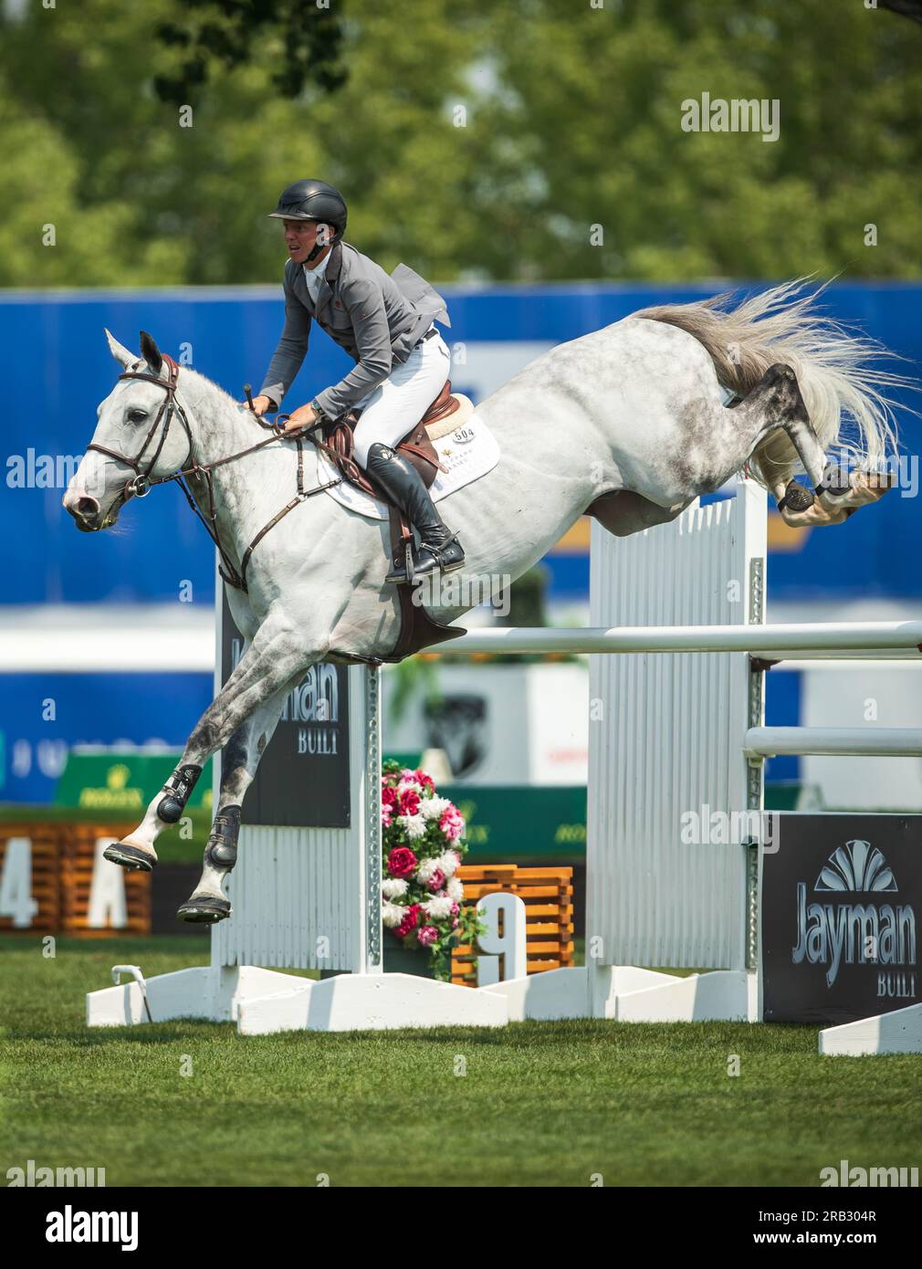 Matthew Sampson della Gran Bretagna gareggia nel Rolex North American Grand Prix a Spruce Meadows. Foto Stock