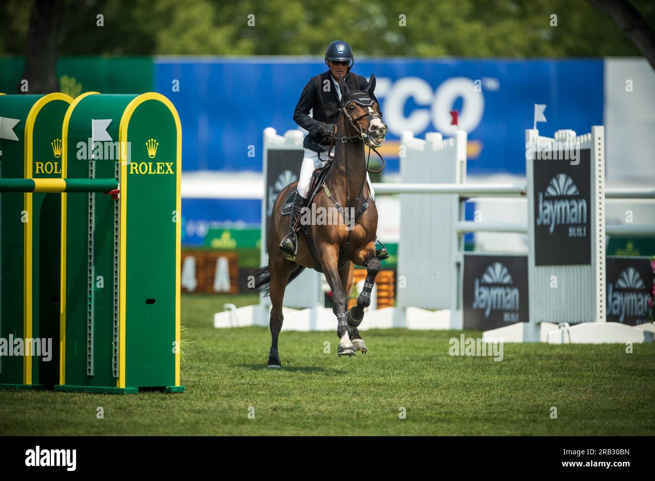 L'irlandese Paul o'Shea gareggia nel Rolex North American Grand Prix a Spruce Meadows. Foto Stock