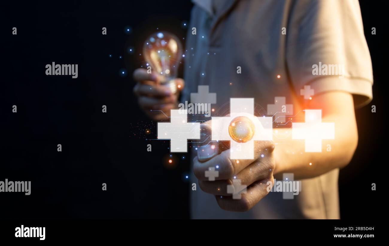 L'idea di aggiungere energia positiva al lavoro e al successo aziendale. obiettivo Foto Stock