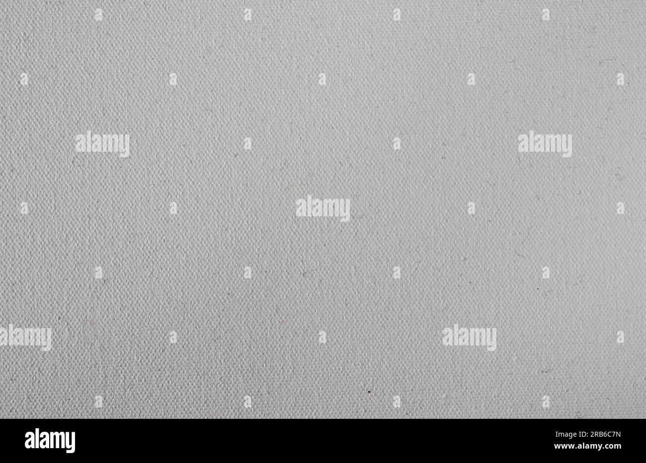 Sfondo granuloso grigio chiaro su tela polverosa Foto Stock