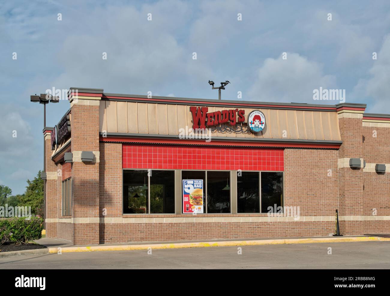 Houston, Texas USA 07-04-2023: Ristorante fast food Wendy's davanti al negozio a Houston, Texas. Famosa catena di fast food americana, fondata nel 1969. Foto Stock