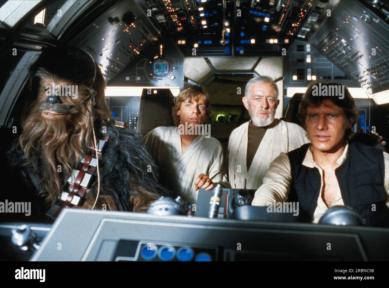 Star Wars Star Wars episodio IV: Una nuova speranza Peter Mayhew, Mark Hamill, Alec Guinness e Harrison Ford Foto Stock