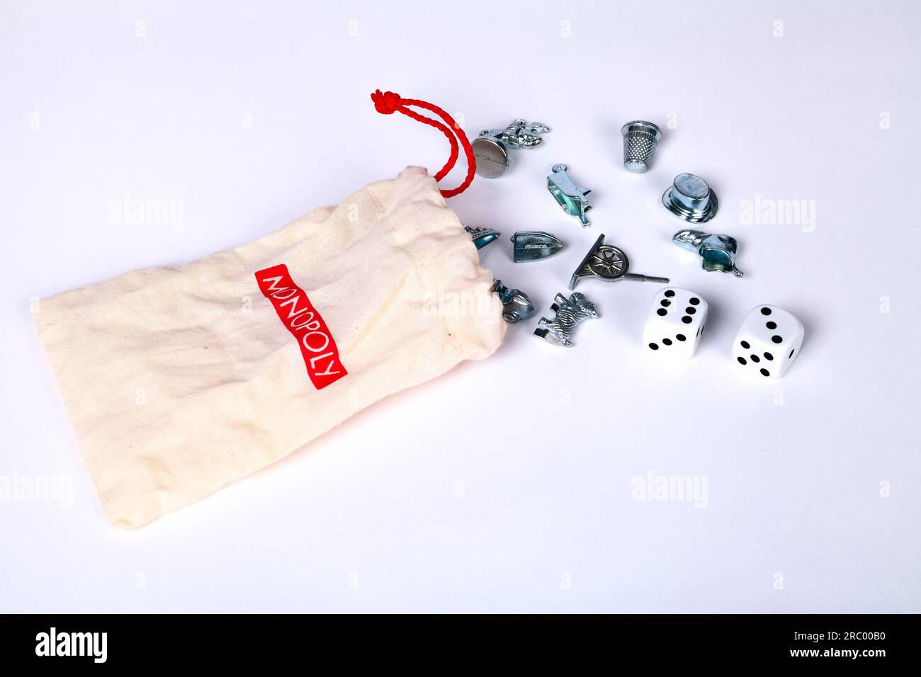 Monopolio di pedine e dadi Foto Stock