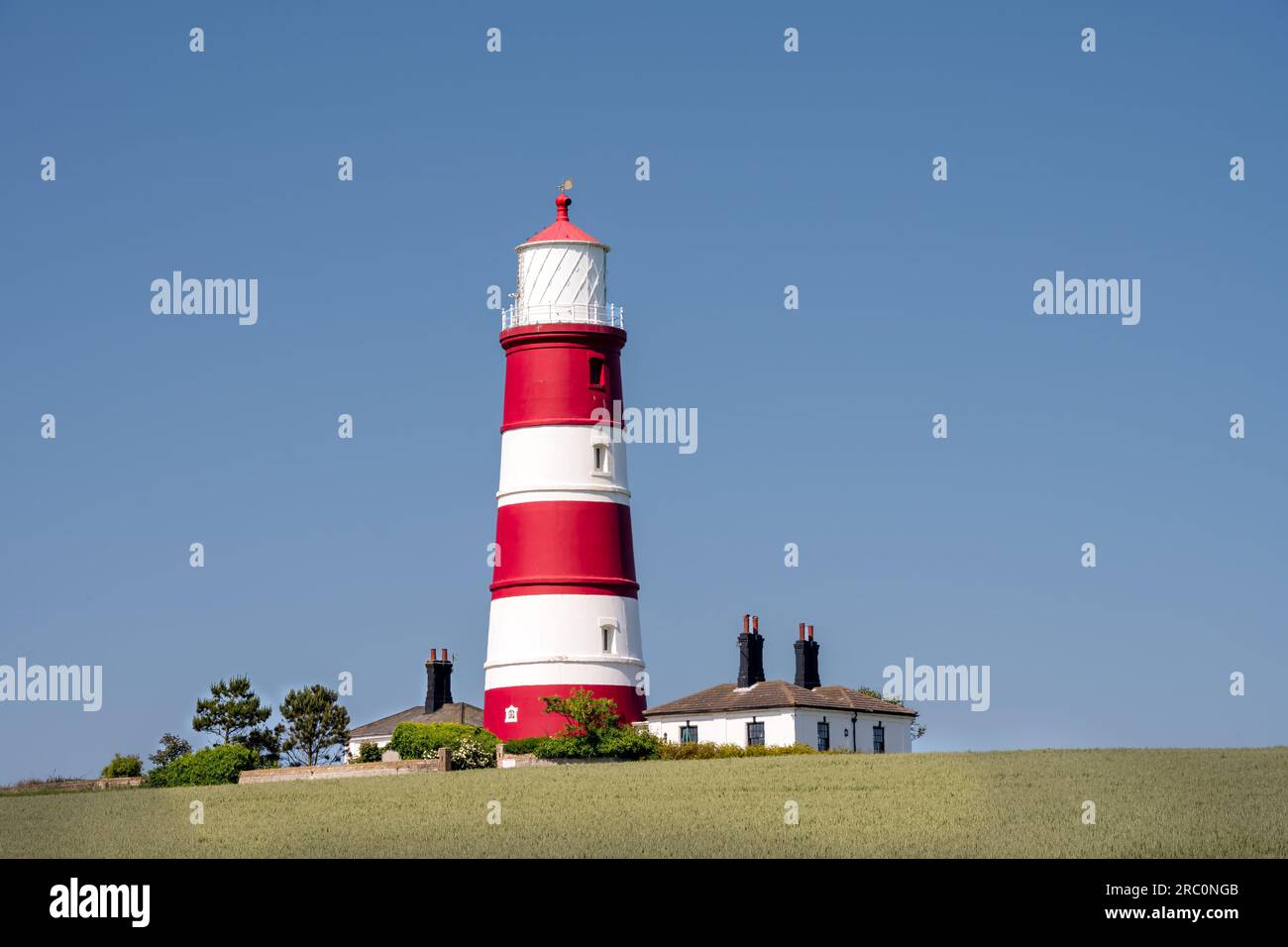 Vista del faro di Happisburgh in un pomeriggio primaverile, North Norfolk, Inghilterra Foto Stock