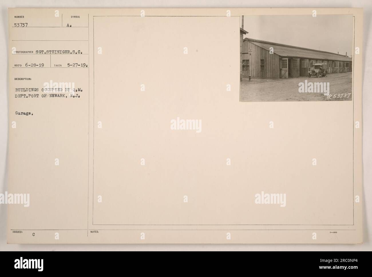 Vista degli edifici occupati dal Q.M. Dipartimento nel porto di Newark, New Jersey. Questa foto, scattata il 27 maggio 1919, mostra il Garage NUMERO 53737. Il garage ha il simbolo "A" e fa parte della configurazione più ampia degli edifici utilizzati dal reparto QM₂. Foto Stock