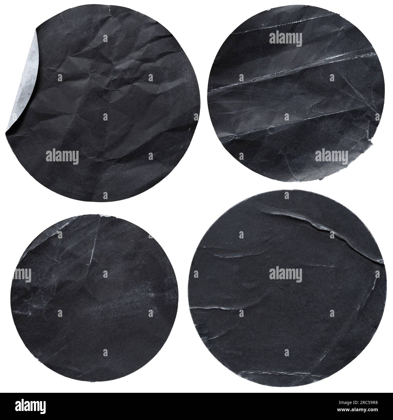 Adesivi rotondi di carta nera su sfondo bianco con percorso di ritaglio Foto Stock
