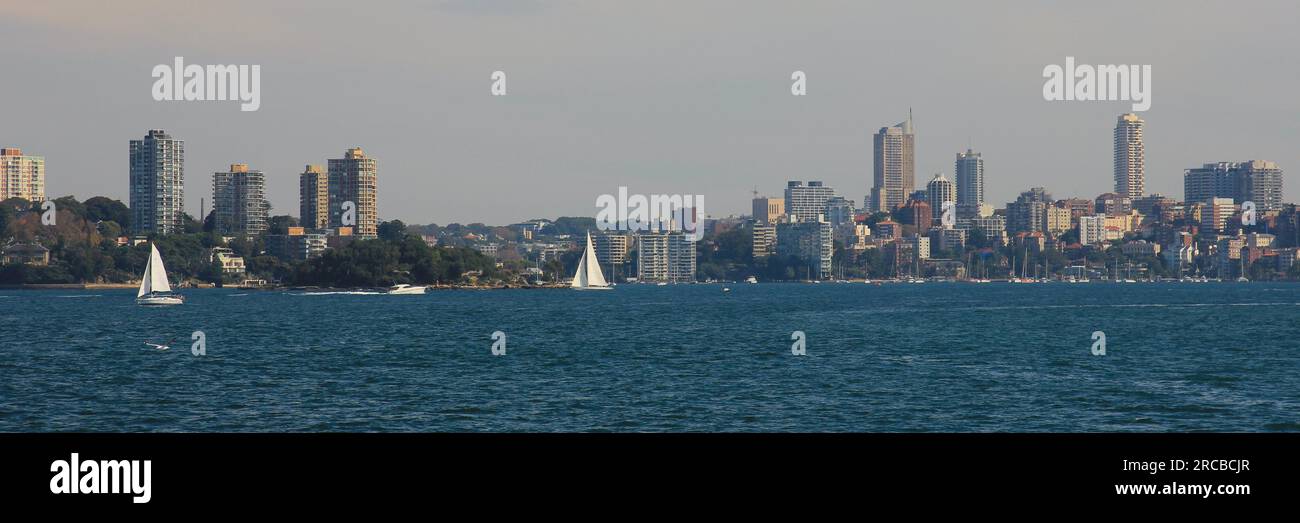 Barche a vela e case a Sydney Foto Stock