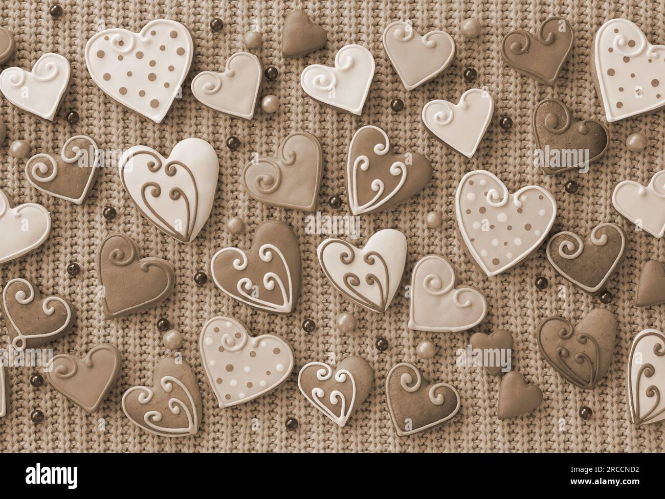 Sfondo carino per San Valentino. Tessuto a maglia rosa. Vista dall'alto Foto Stock