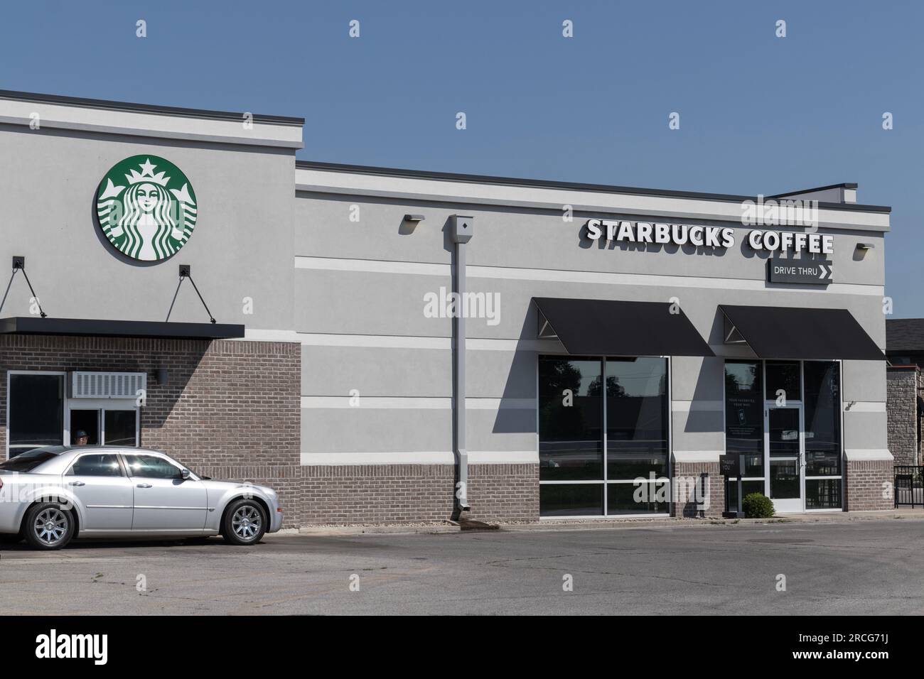 Kokomo - 14 luglio 2023: Starbucks Retail Coffee Store. Ogni anno, Starbucks festeggia l'autunno con i Lattes di Pumpkin Spice. Foto Stock