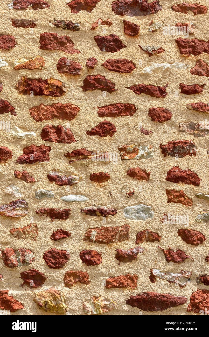 Particolare dei materiali da costruzione tradizionali in pietra rossa utilizzati per le case della Brenne - Rosnay, Brenne, Indre (36), Francia. Foto Stock