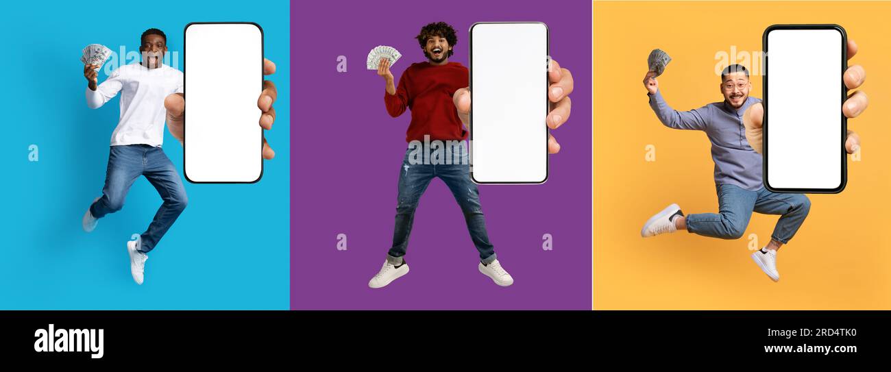 Felicissimi uomini multirazziali con soldi che mostrano telefoni con schermo vuoto Foto Stock