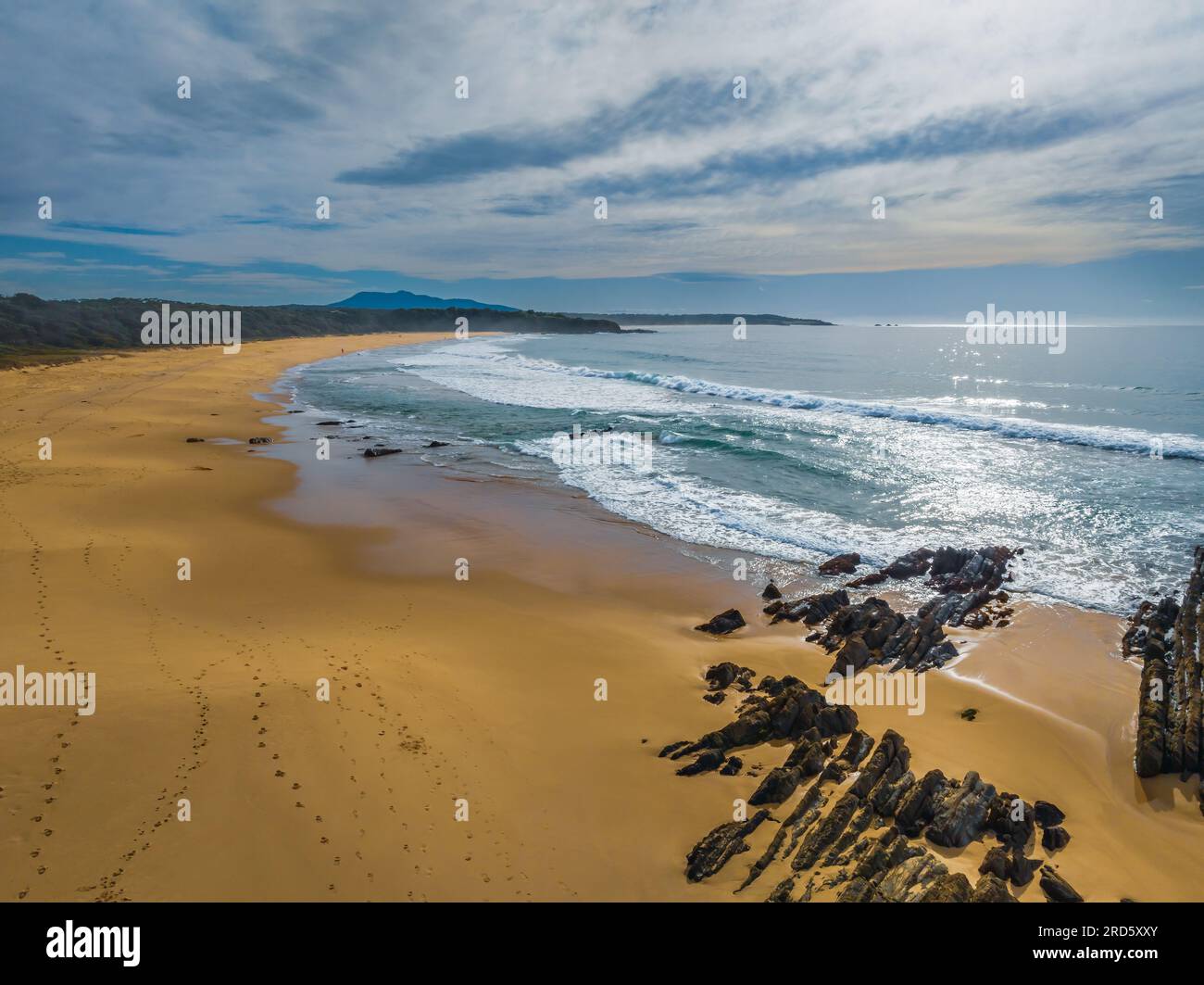 Esplorare Cuttagee Beach sulla costa della costa di Sapphire, nella costa meridionale del New South Wales, Australia Foto Stock