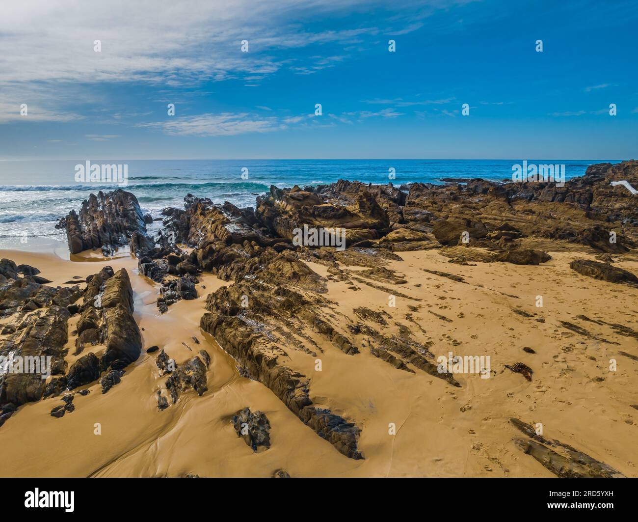 Esplorare Cuttagee Beach sulla costa della costa di Sapphire, nella costa meridionale del New South Wales, Australia Foto Stock