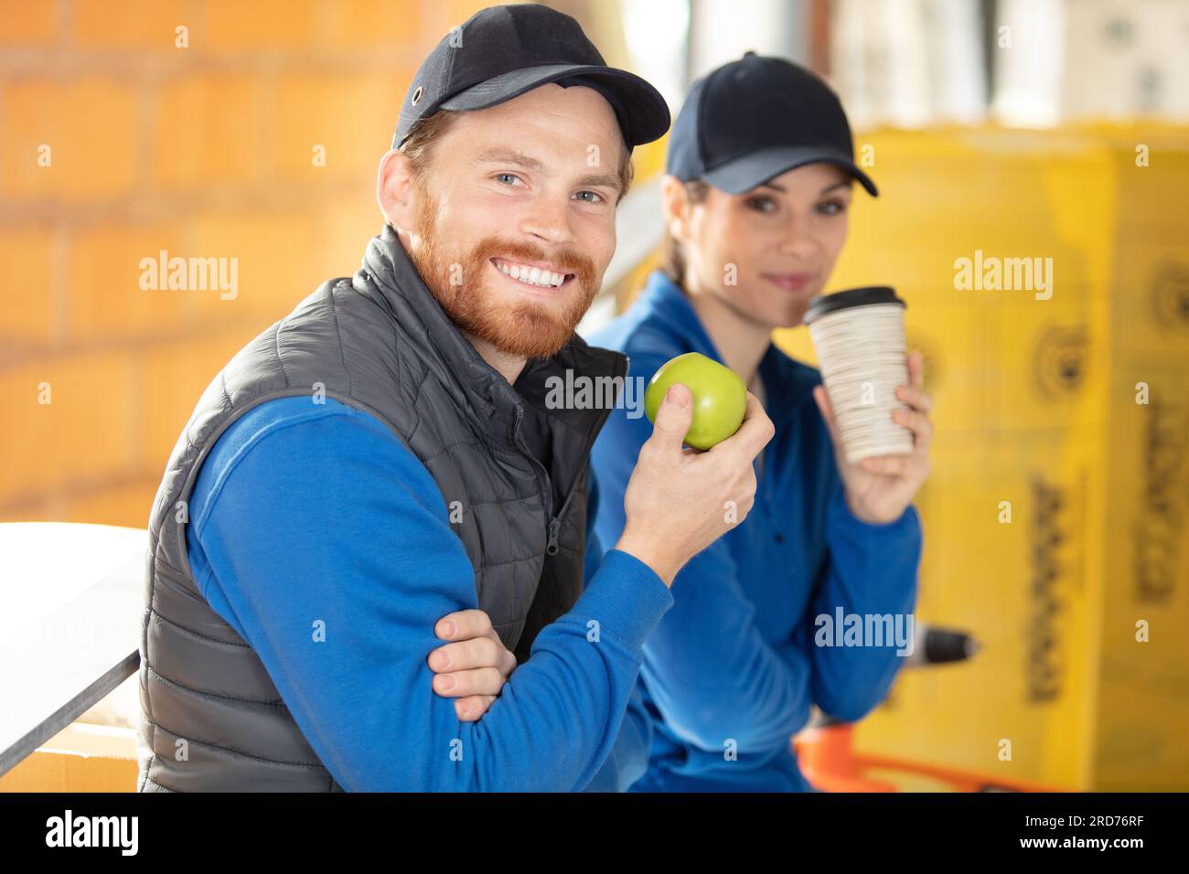 lavoratori di costruzione che hanno pausa caffè Foto Stock